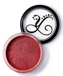 Desire Blush in a burnt red shade with warm undertones.