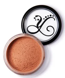 Peach bronze highlighting powder for a luminous complexion.